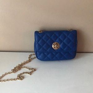 Blue leather purse with gold chain strap